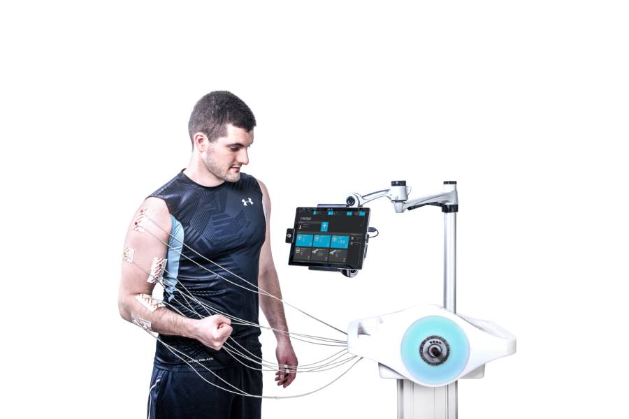 Man doing rehab training with Luna-EMG robotic therapy system