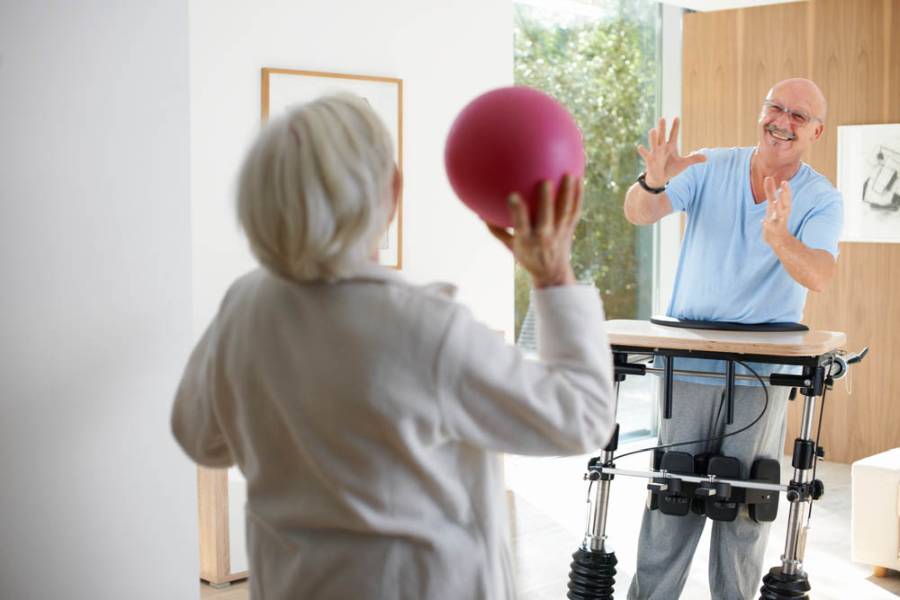 People during exercise training with a THERA-Trainer